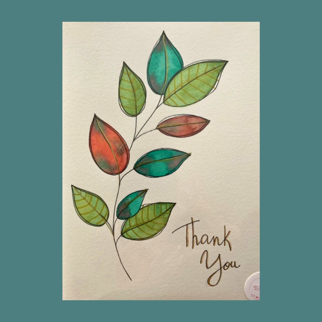 Hand-painted thank you card featuring green and gold leaves with 'THANK YOU' text at the bottom.