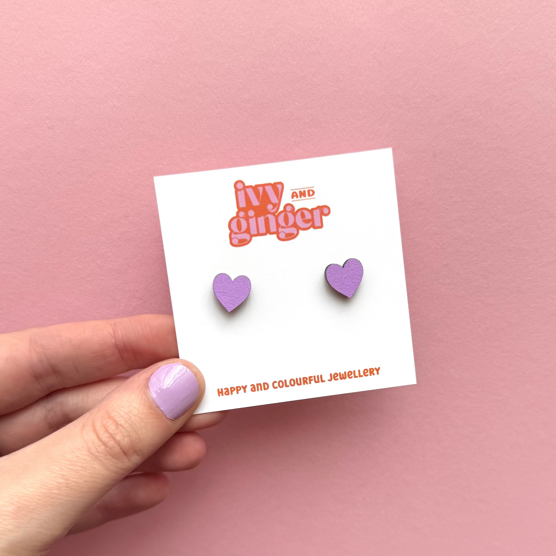 Lilac mini heart stud earrings by Ivy and Ginger hand painted FSC wood jewellery