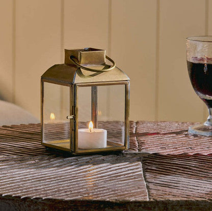 Nkuku Maro brass lantern with glass panels tealight holder
