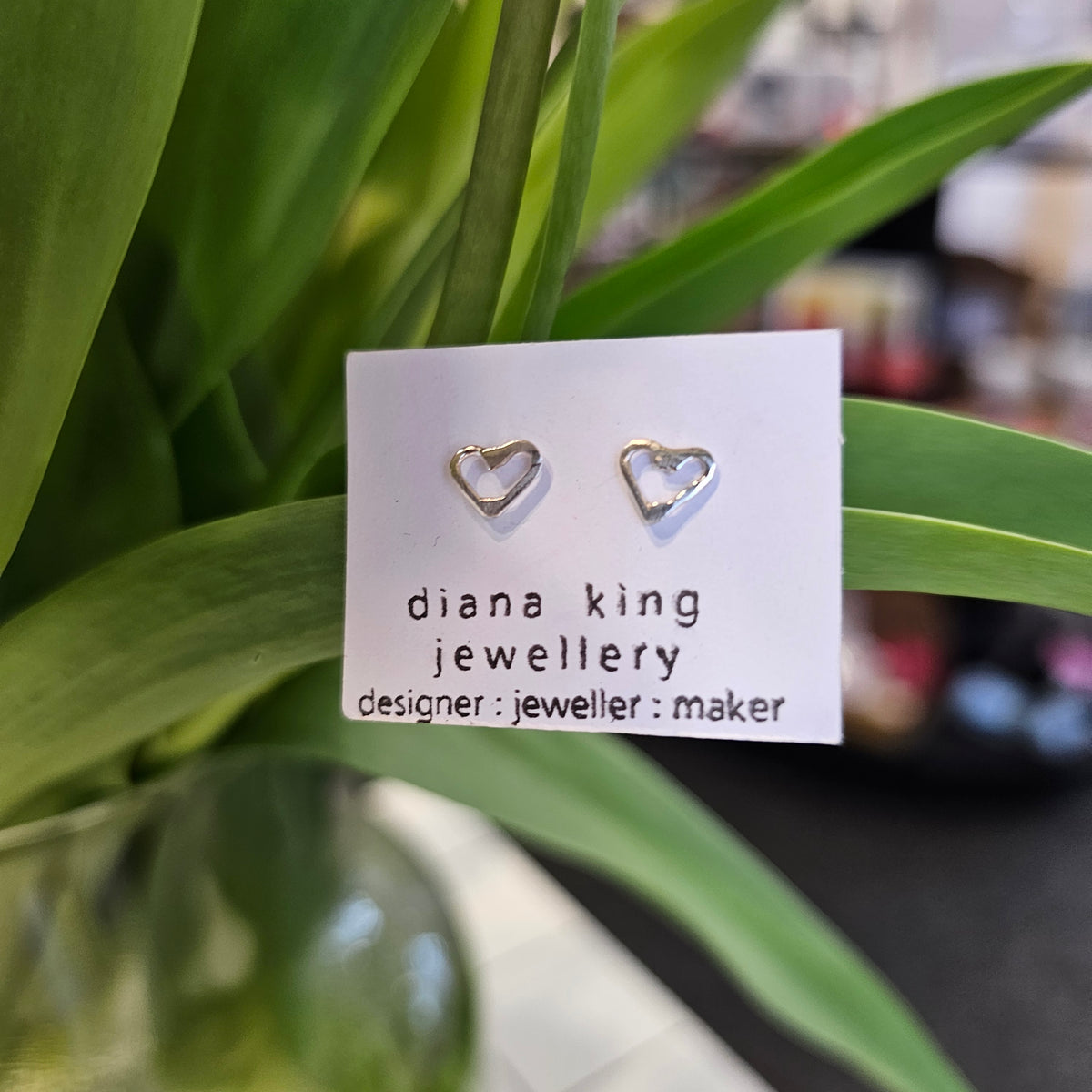 Diana King Jewellery sterling silver mini heart stud earrings with 6mm heart designs, sterling silver posts and butterfly backs, handmade in Perthshire.
