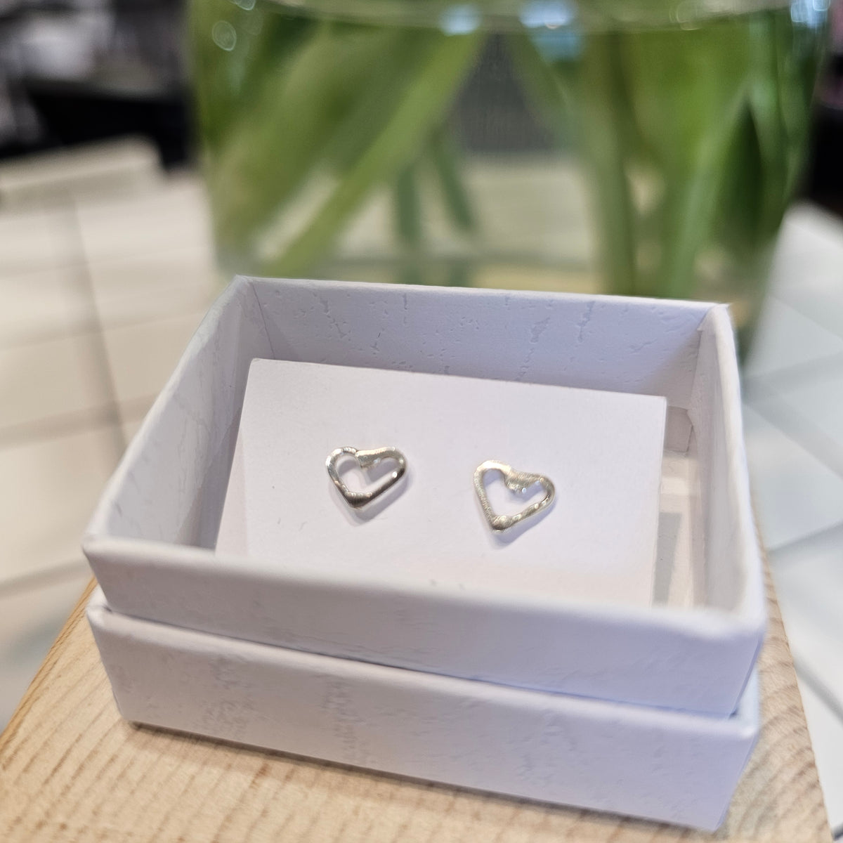 Diana King Jewellery sterling silver mini heart stud earrings with 6mm heart designs, sterling silver posts and butterfly backs, handmade in Perthshire.