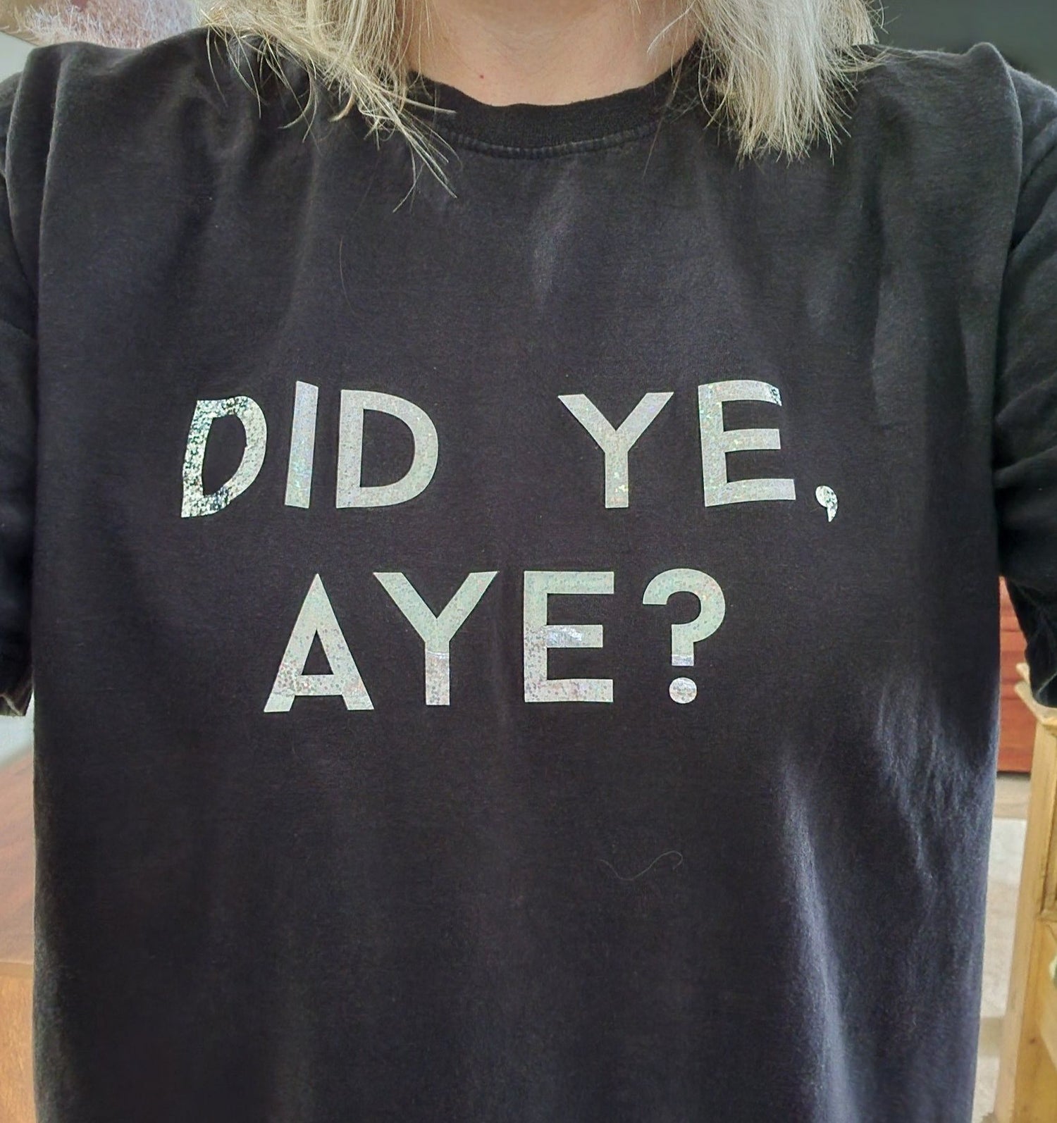 Elaine from My Scottish Heart wearing black t-shirt with 'DID YE, AYE?' text