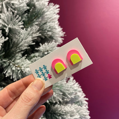 Zero-waste neon Jesmonite arch stud earrings by Nine Angels with stainless steel posts.