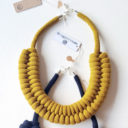 Ragged House large recycled cotton macrame cord knot necklace with figure 8 bow-shaped statement design