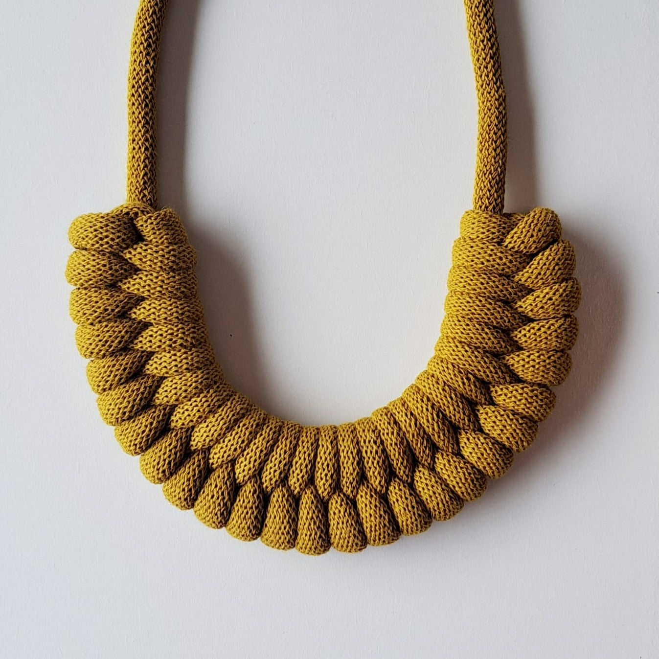 Ragged House medium recycled cotton macrame cord knot necklace with figure 8 bow bow-shaped statement design