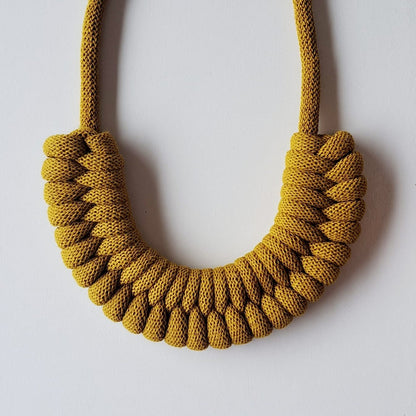 Ragged House medium recycled cotton macrame cord knot necklace with figure 8 bow bow-shaped statement design