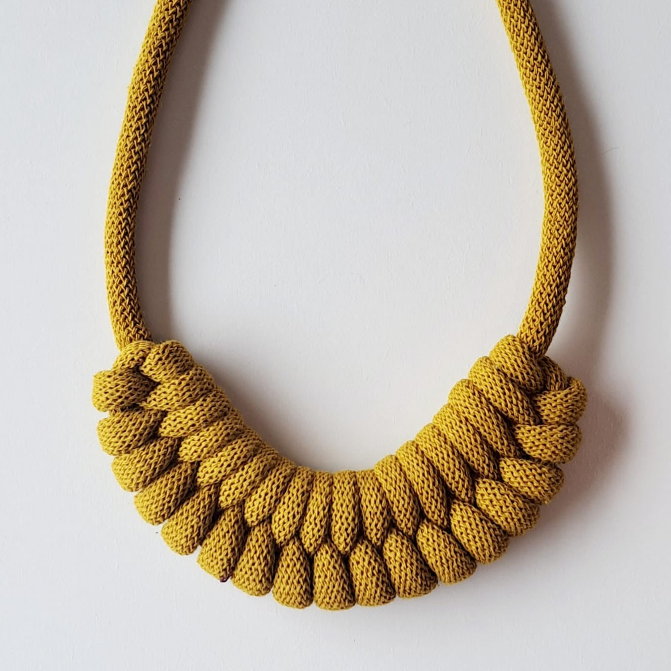 Ragged House small recycled cotton macrame cord knot necklace with figure 8 bow design statement accessory