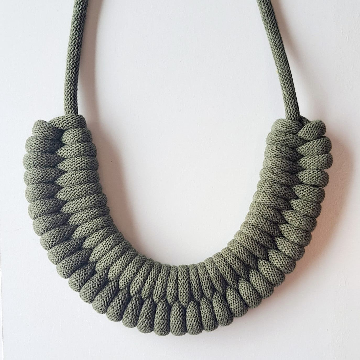 Ragged House large recycled cotton macrame cord knot necklace with figure 8 bow-shaped statement design