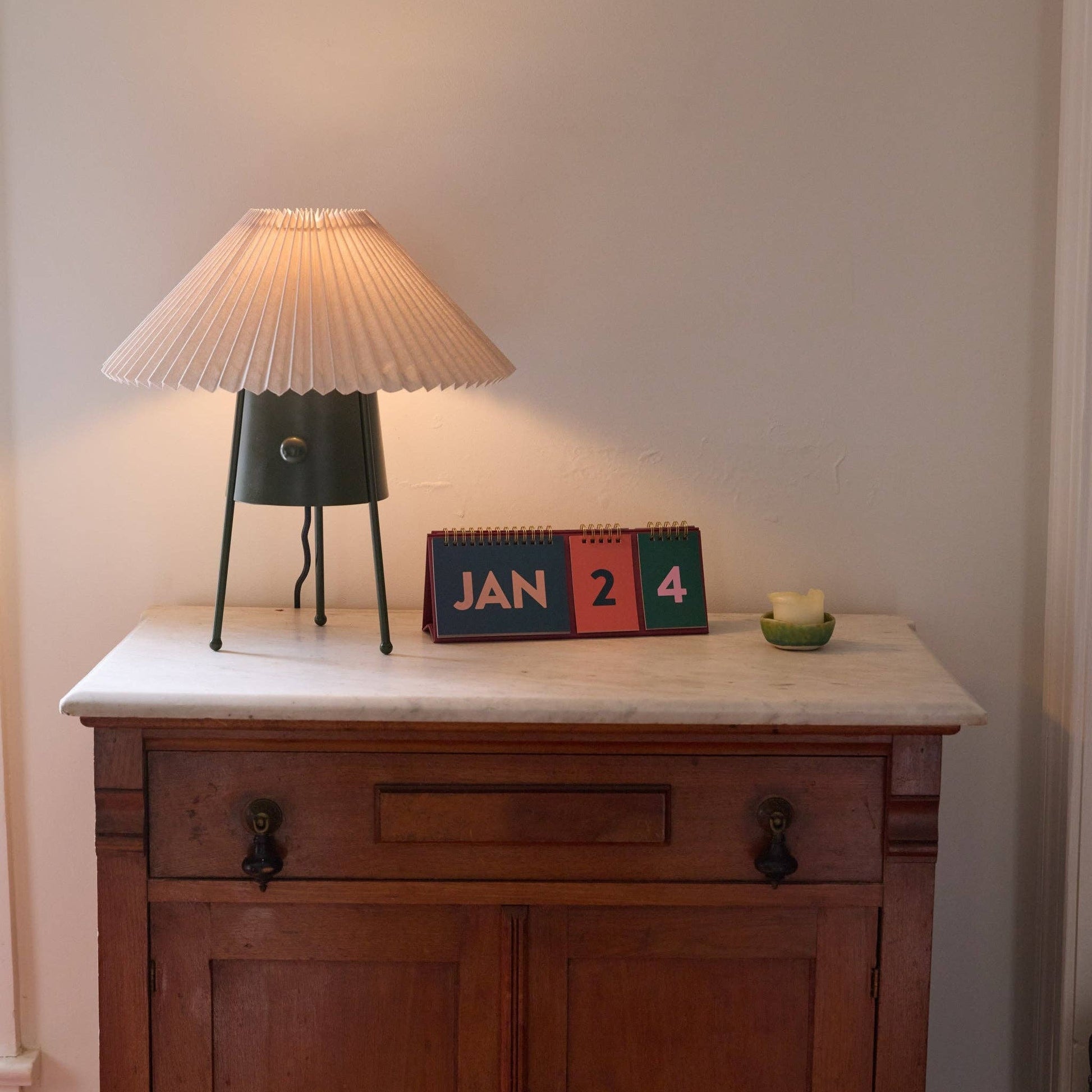 Designworks Ink Colourblock perpetual desk calendar with bold coloured pages and a freestanding A-frame design