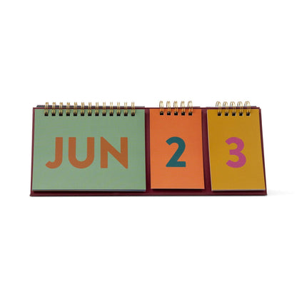 Designworks Ink Colourblock perpetual desk calendar with bold coloured pages and a freestanding A-frame design
