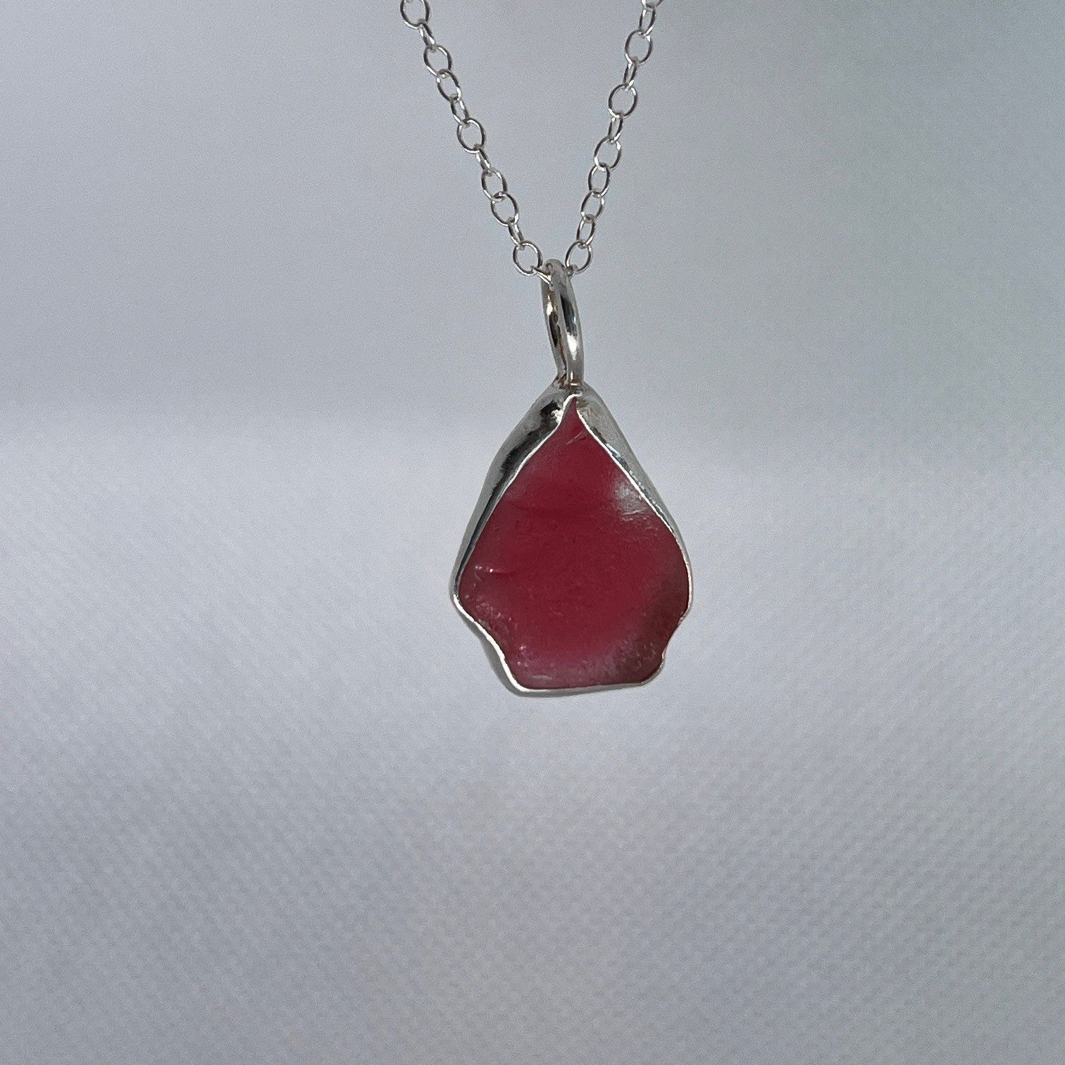 Sterling silver and pink sea glass pendant necklace handmade in Dundee with triangle shape design