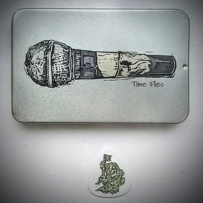 Silver tin with Microphone image and 'Time Flies' text on the sliding lid.