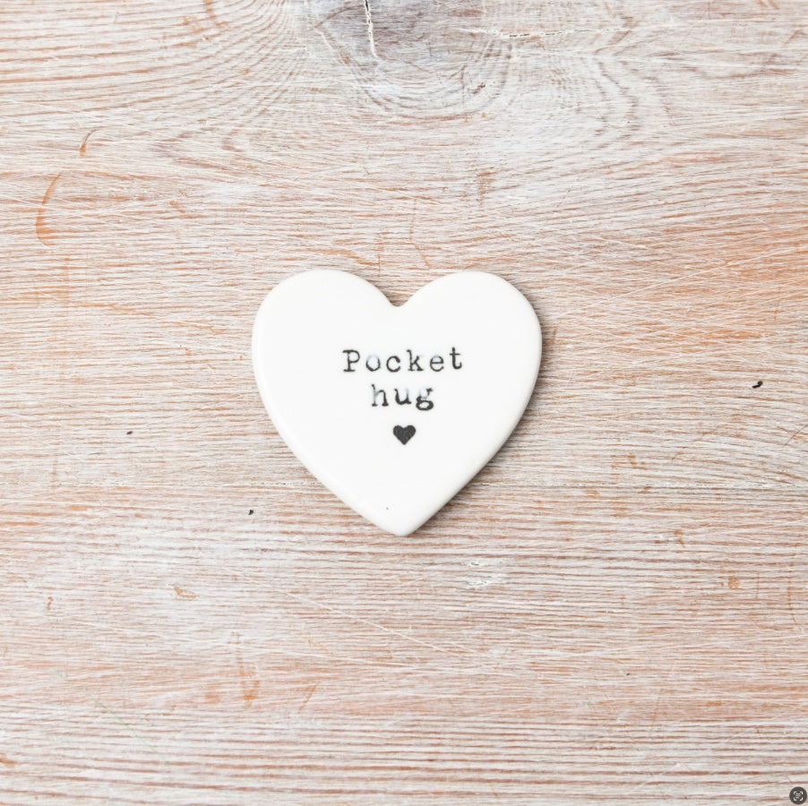 White Heart-shaped ceramic token with 'Pocket Hug' text