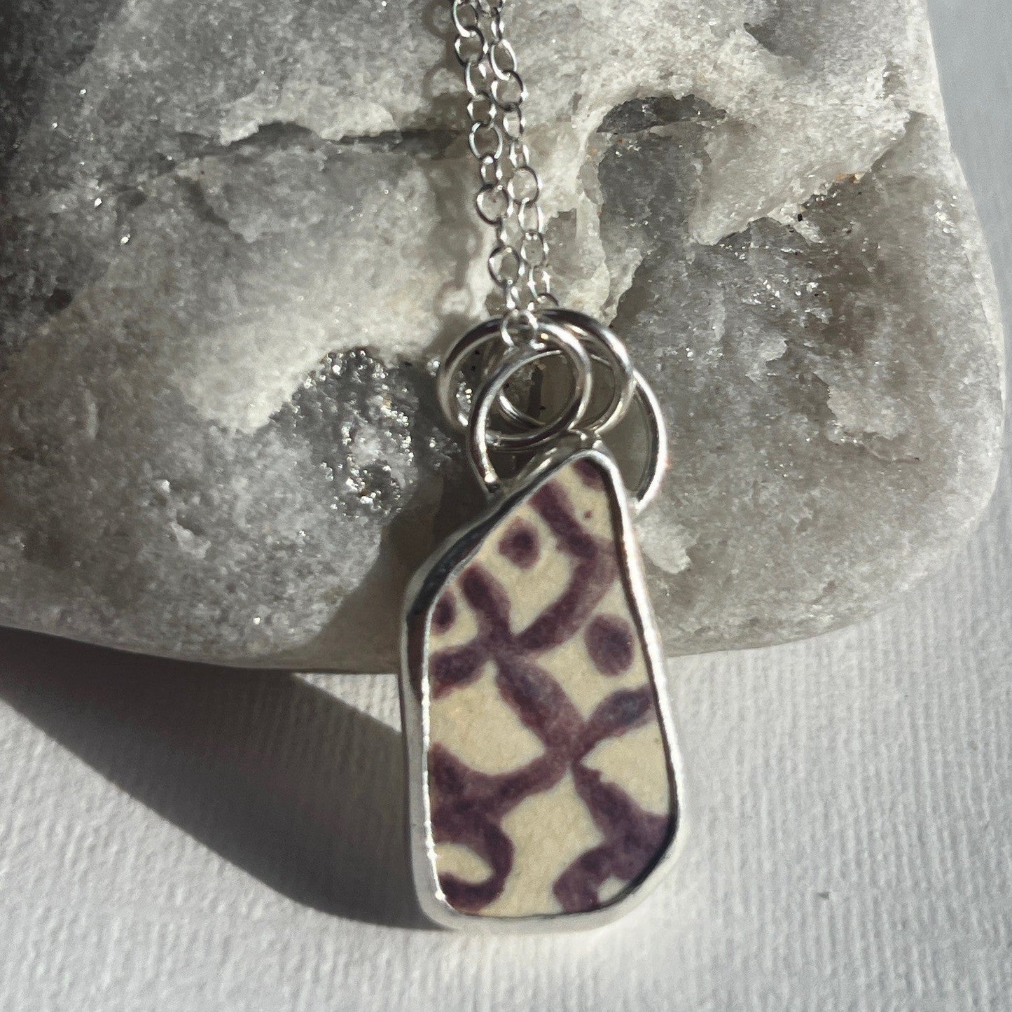 Purple and white sea pottery and sterling silver pendant necklace