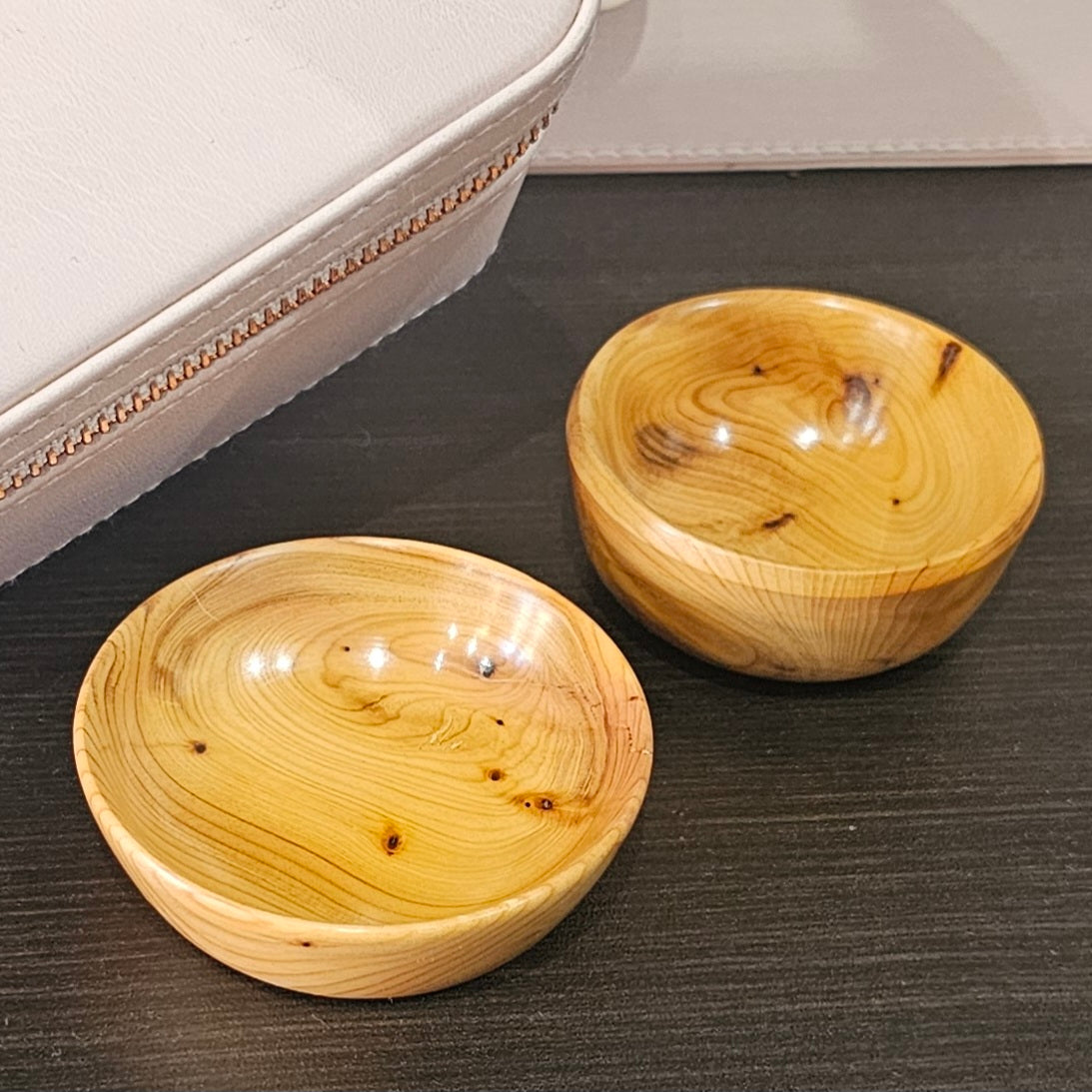 Two tiny wooden yew bowls handmade in Carnoustie by John Dowie