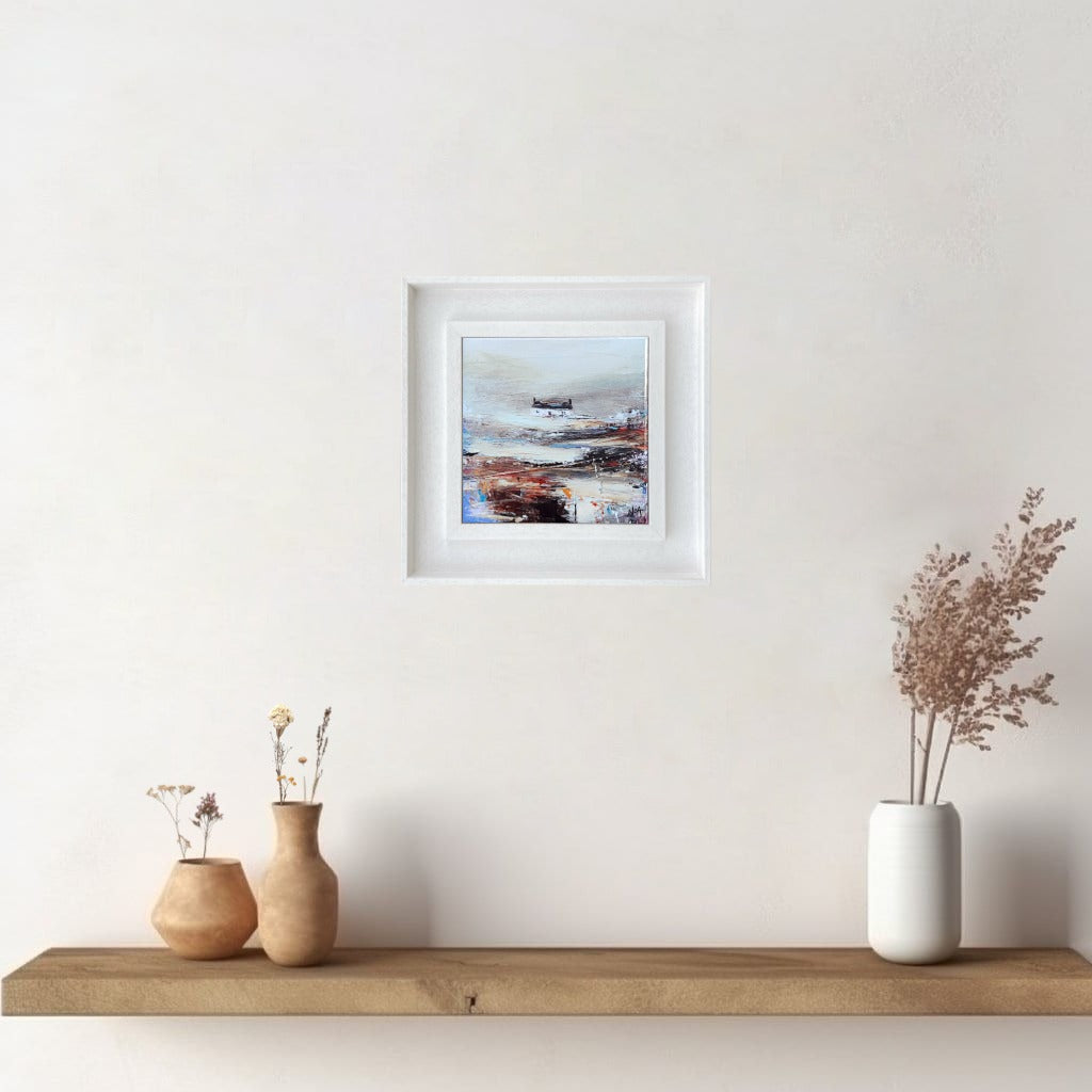 A ceramic tile print of a colourful painting titled 'Rolling Fog', showing a small house nestled in the Scottish Highlands, available mounted on natural slate or framed.