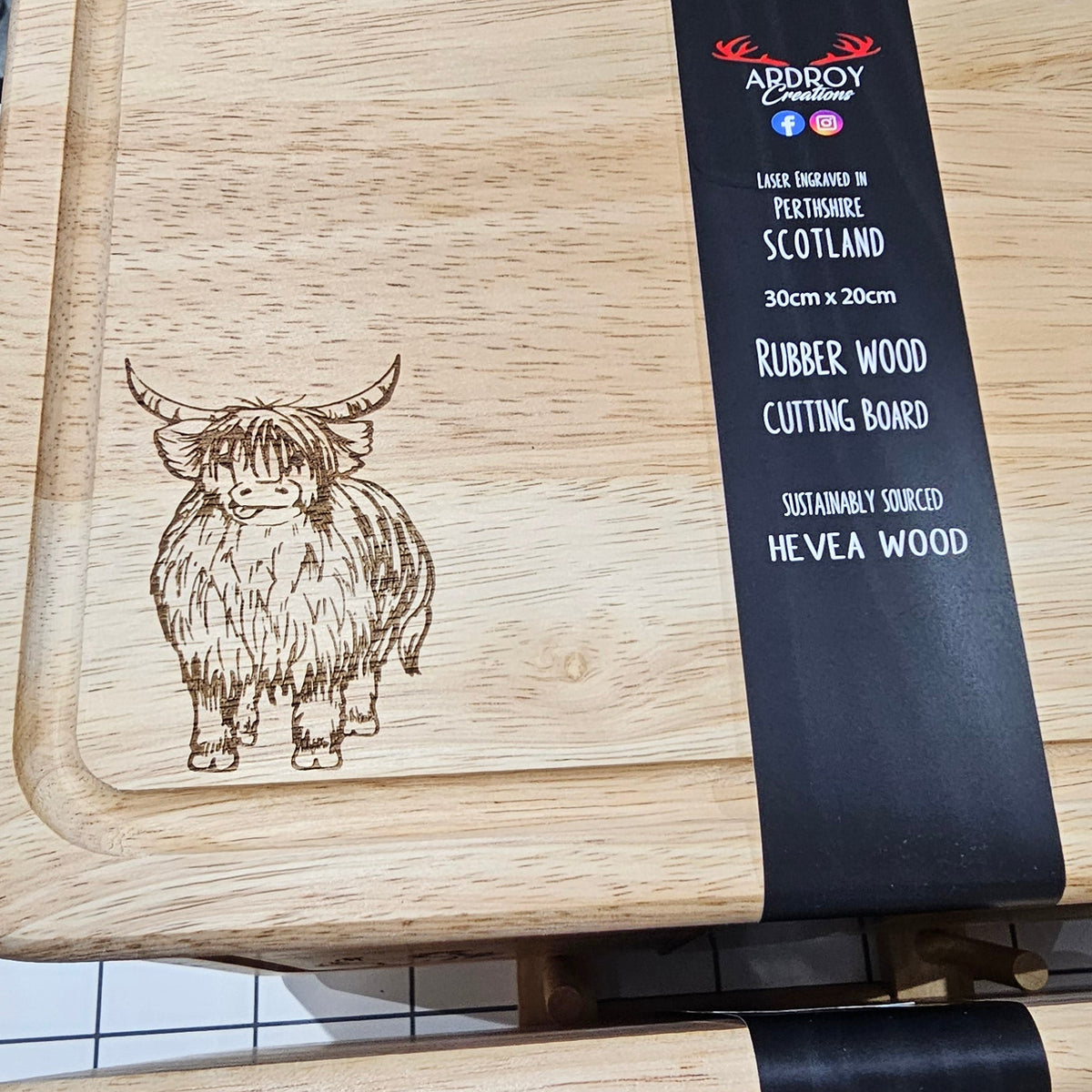 Ardroy Creations Scottish rubberwood boards measuring 30 x 20cm, featuring engraved Stag, Highland Coo, Thistle, Puffin, Red Squirrel and Landrover designs.