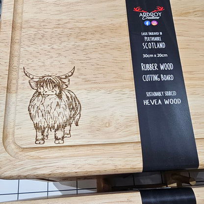 Ardroy Creations Scottish rubberwood boards measuring 30 x 20cm, featuring engraved Stag, Highland Coo, Thistle, Puffin, Red Squirrel and Landrover designs.