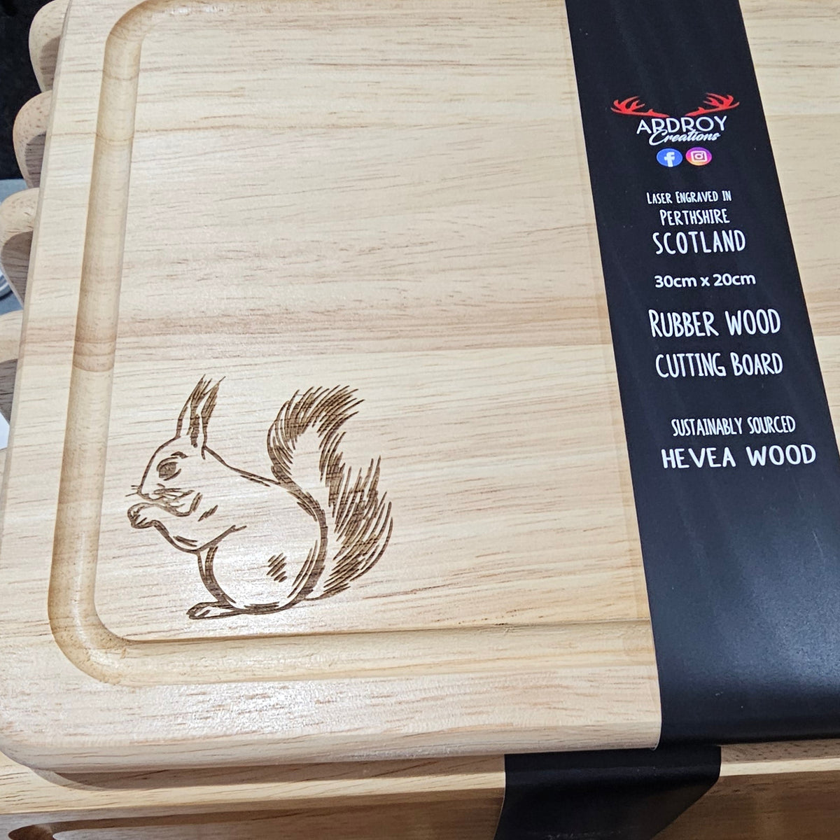 Ardroy Creations Scottish rubberwood boards measuring 30 x 20cm, featuring engraved Stag, Highland Coo, Thistle, Puffin, Red Squirrel and Landrover designs.