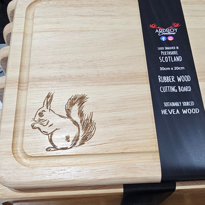 Ardroy Creations Scottish rubberwood boards measuring 30 x 20cm, featuring engraved Stag, Highland Coo, Thistle, Puffin, Red Squirrel and Landrover designs.