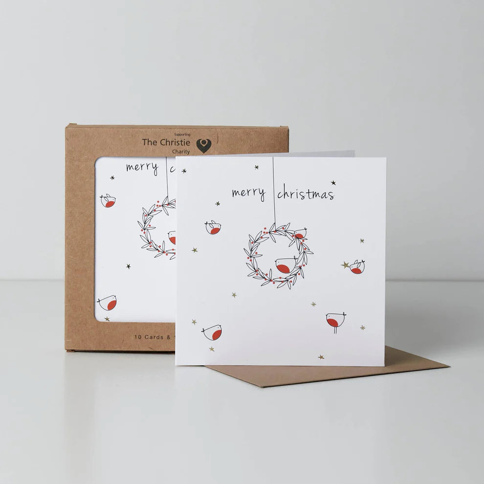 A pack of Christmas cards with a festive wreath and robins design