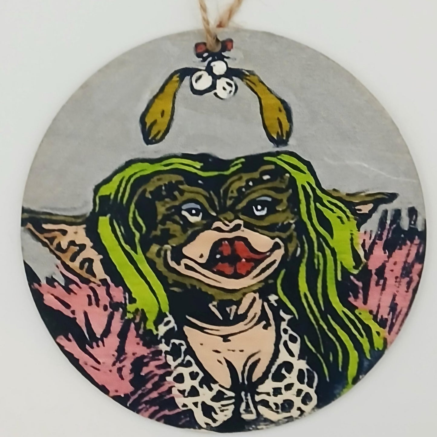 Large handprinted wooden Christmas tree decorations (10cm) featuring Greta from popular Christmas movie The Gremlins