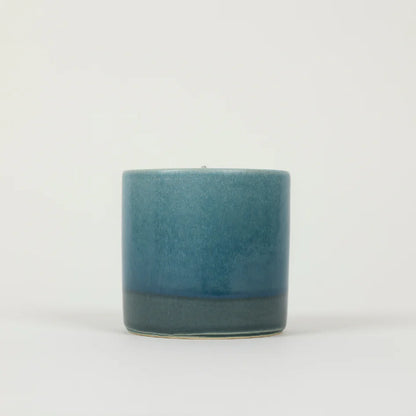 Blue St Eval Sea Salt ceramic candle on a white background