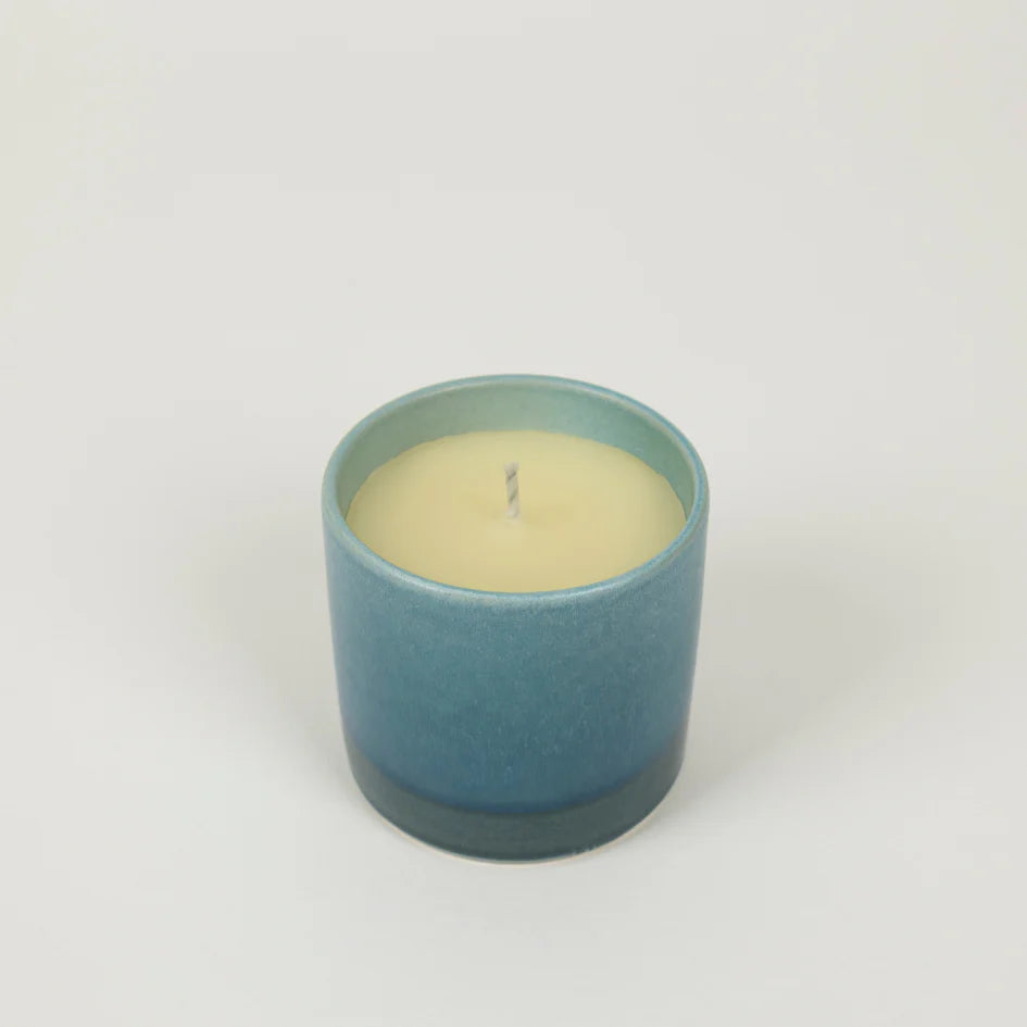 Blue St Eval Sea Salt ceramic candle on a white background