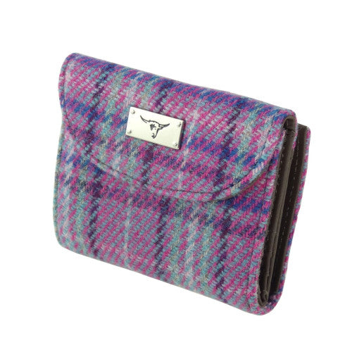 Harris Tweed Jura Short Wallet Purses in assorted colours, tartans and checks, featuring a folding wallet design and central zipped coin compartment.