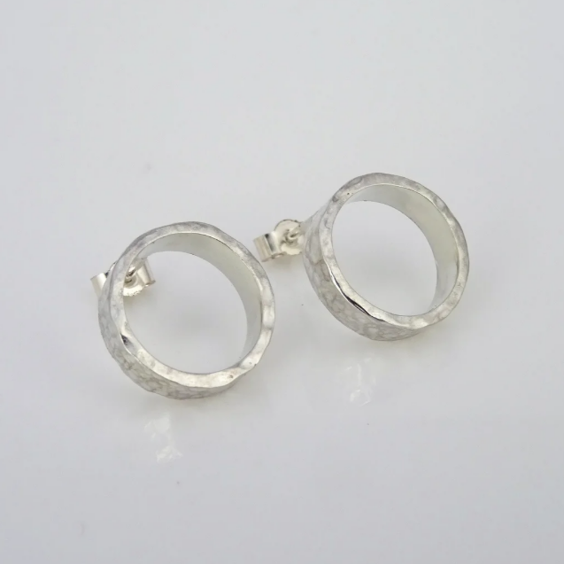 Scarlett Erskine Sista Collection Silver Midi Loop Stud Earrings featuring a contemporary loop design with a hammered, textured silver finish.