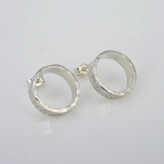 Scarlett Erskine Sista Collection Silver Midi Loop Stud Earrings featuring a contemporary loop design with a hammered, textured silver finish.