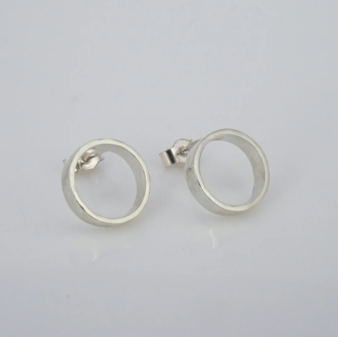 Scarlett Erskine Silver Small Smooth Loop Earrings from the Sista Collection, featuring a high-polished silver finish and measuring 10mm x 2.7mm.