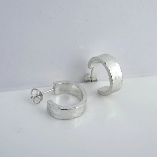 Scarlett Erskine Silver Statement Sista Hoop Earrings featuring chunky silver hoops with a hammered textured finish, 15-20mm drop and 5mm width.