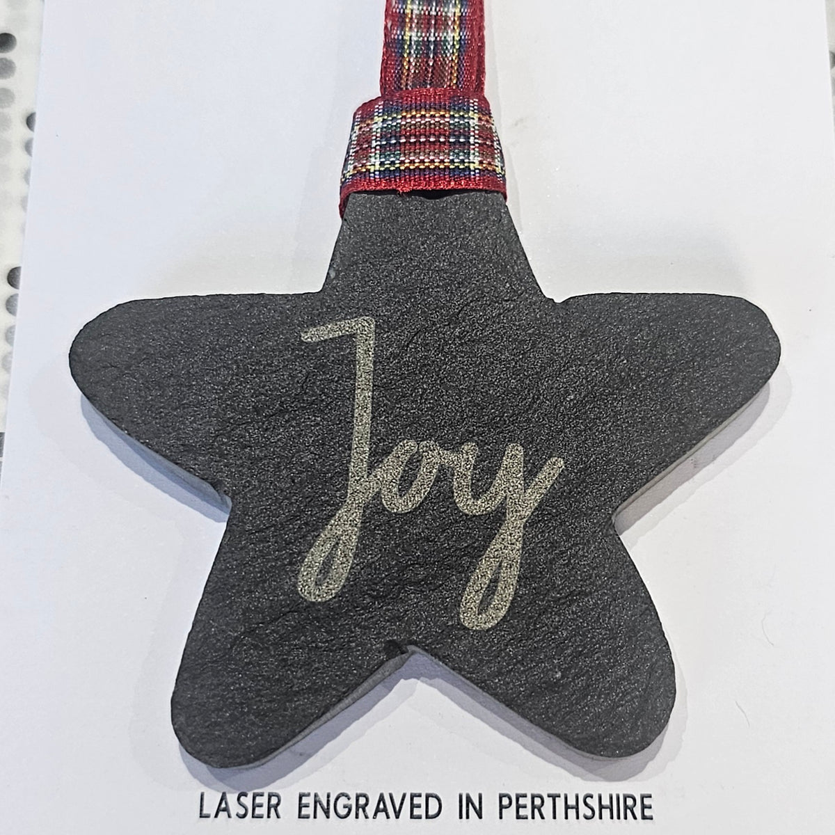 Ardroy Creations slate Christmas baubles in 7cm circle and star shapes, featuring Carnoustie Hotel, Antlers, Define Good, Granny, Nana, Blitzened, Tinsel, Merry, Joy and Merry & Bright designs.