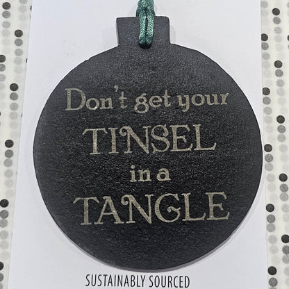 Ardroy Creations slate Christmas baubles in 7cm circle and star shapes, featuring Carnoustie Hotel, Antlers, Define Good, Granny, Nana, Blitzened, Tinsel, Merry, Joy and Merry & Bright designs.