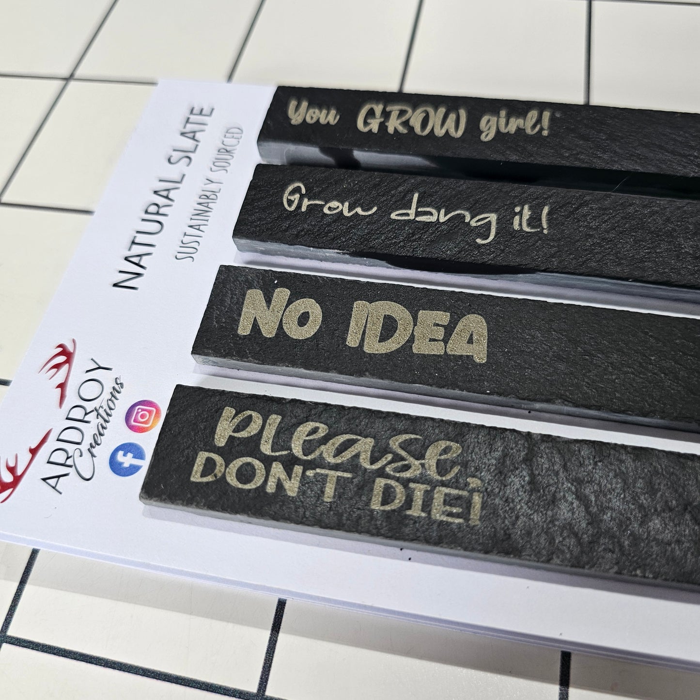 Set of four funny slate plant markers by Ardroy Creations featuring humorous gardening and plant slogans