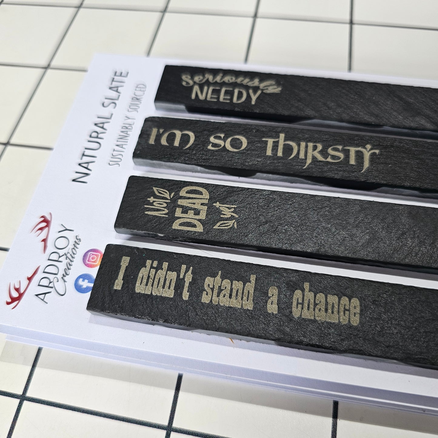 Set of four funny slate plant markers by Ardroy Creations featuring humorous gardening and plant slogans