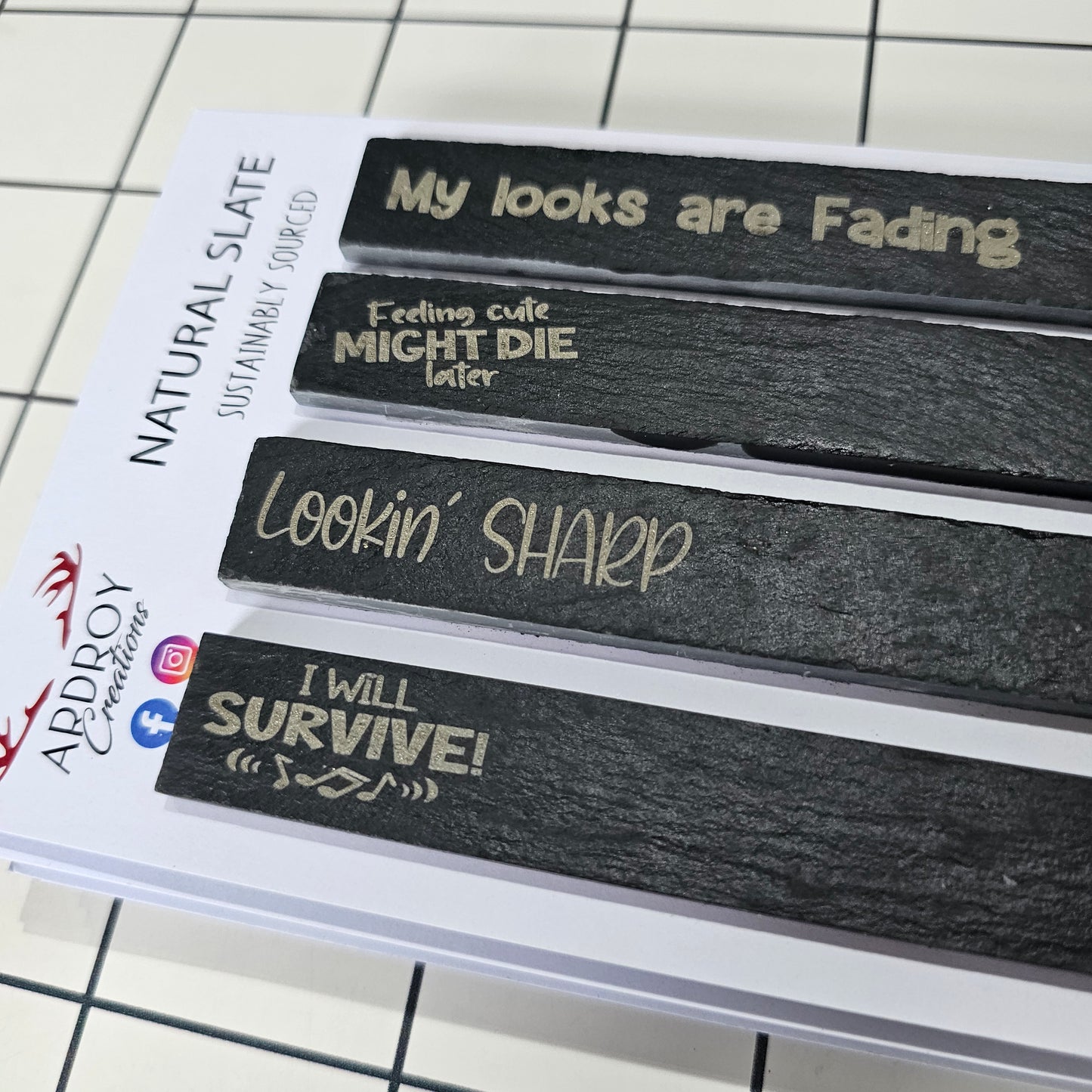 Set of four funny slate plant markers by Ardroy Creations featuring humorous gardening and plant slogans