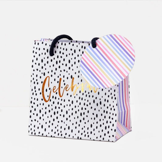 Celebrate luxury small gift bag by Belly Button Designs with black and white spots, rainbow stripes and gold foil