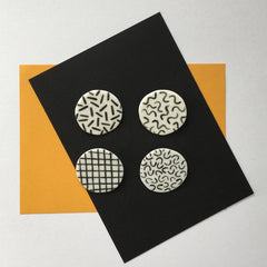 STAPLE BROOCH PIN GRID