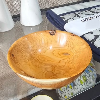 Beautifully handcrafted wooden bowl with unique grain and character