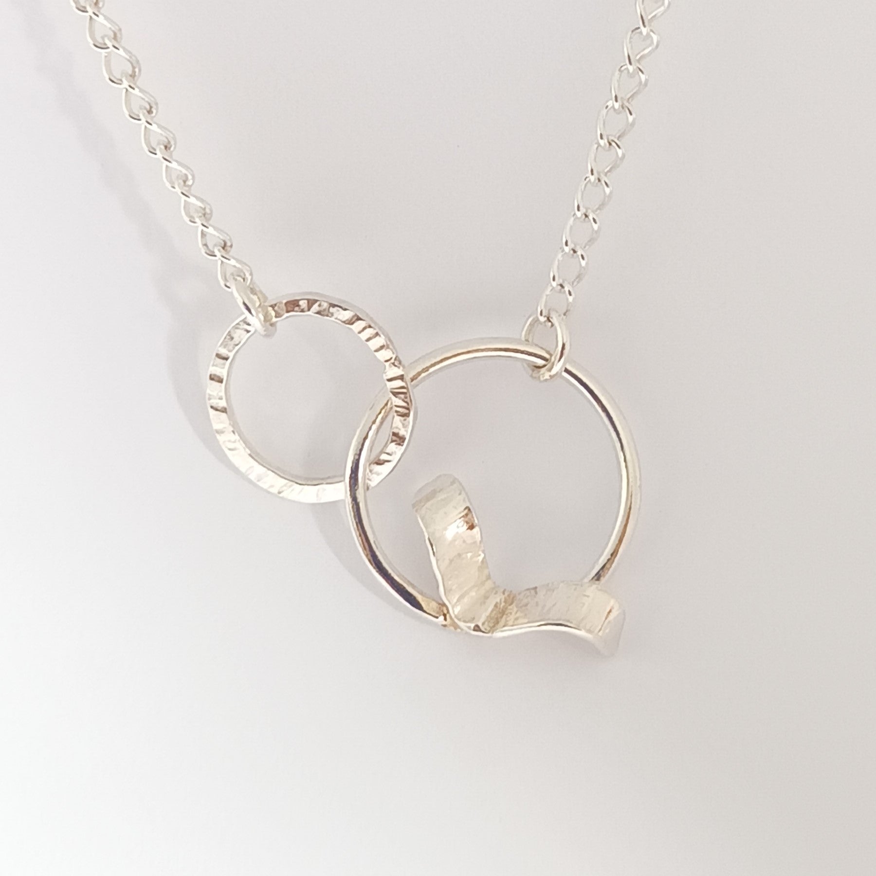 Sterling silver double hoop necklace with bird by Diana King handmade in Perthshire
