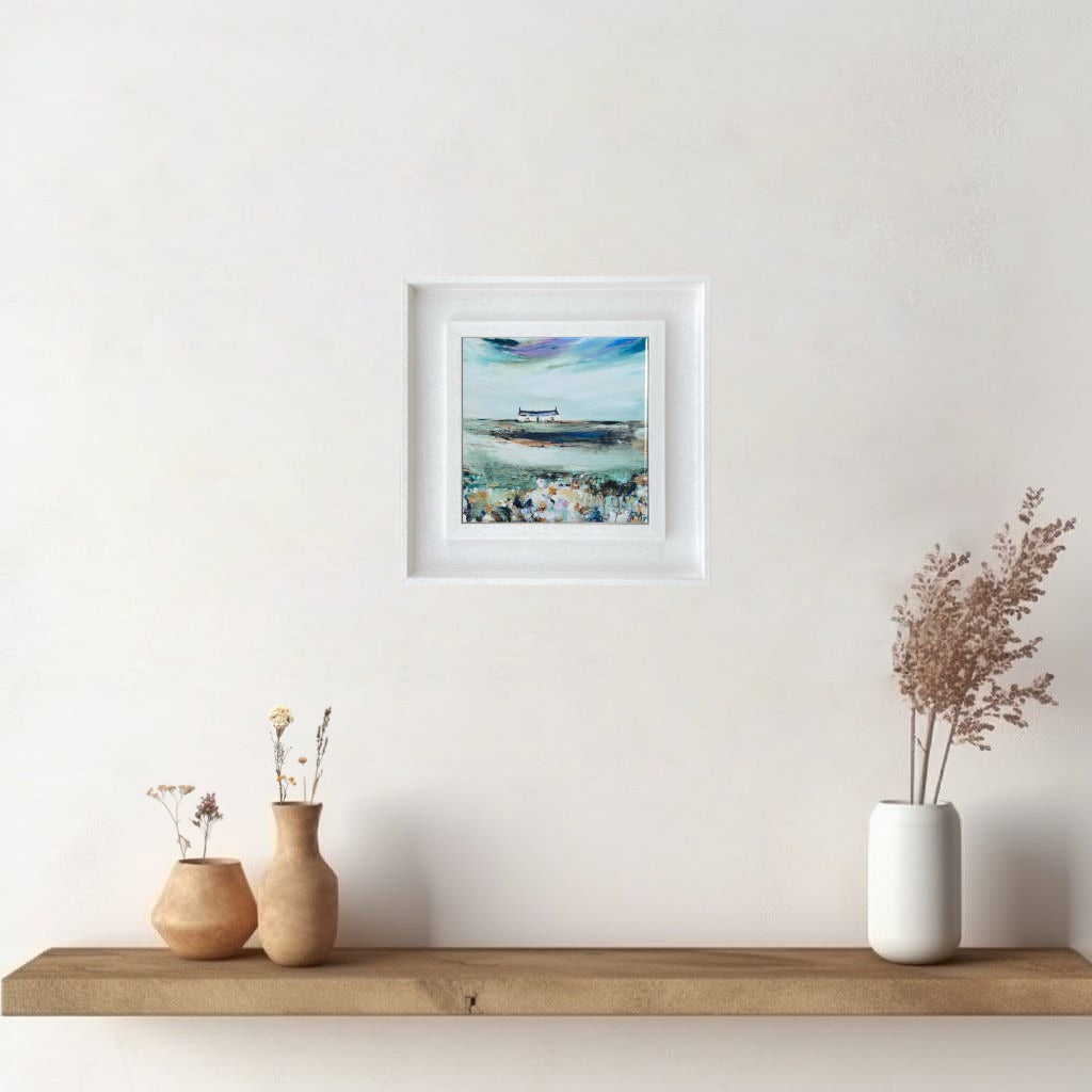 A ceramic tile print of a colourful painting titled 'Spring Days', showing a small house nestled in the Scottish Highlands, available mounted on natural slate or framed.