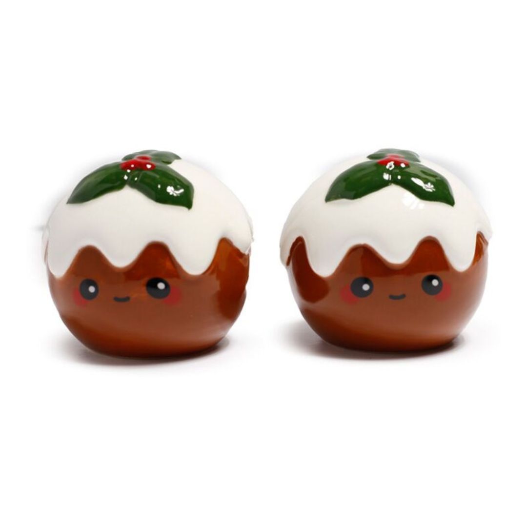 Two cute Christmas pudding-shaped salt and pepper shakers on a white background