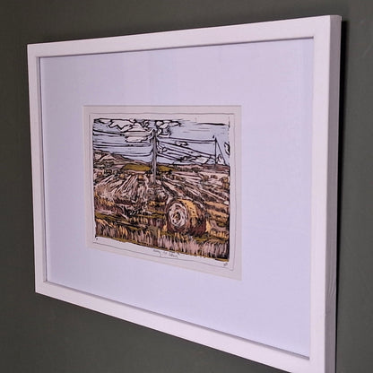 A colourful linocut print by BeeBirds depicting the rolling landscape of Tealing village nestled at the foot of the Sidlaw Hills in Angus, mounted in a white frame.