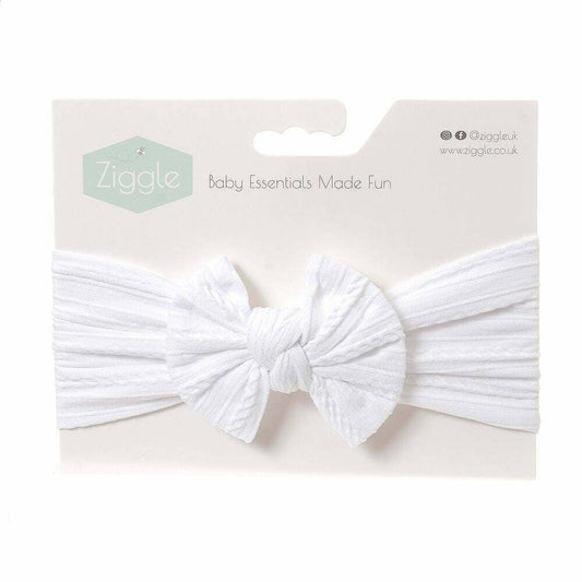 Soft white baby bow headband with a fixed bow and delicate textured pattern for newborns and toddlers