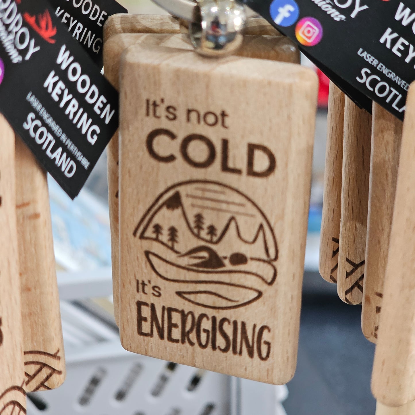 Solid beech wood keyrings by Ardroy Creations with Scottish designs, Scots words and wild swimming slogans