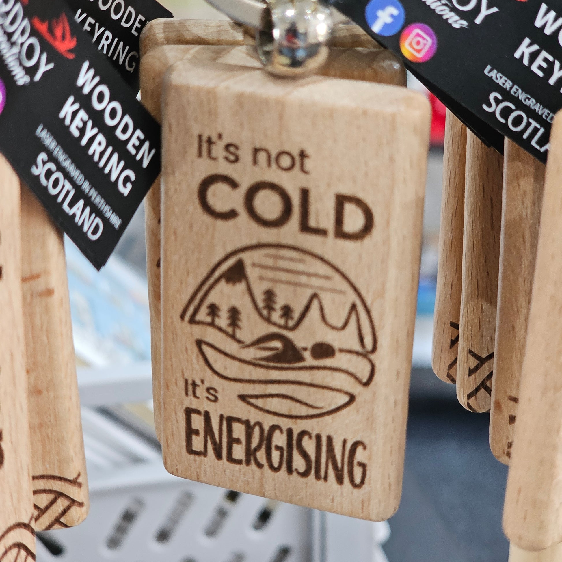 Solid beech wood keyrings by Ardroy Creations with Scottish designs, Scots words and wild swimming slogans