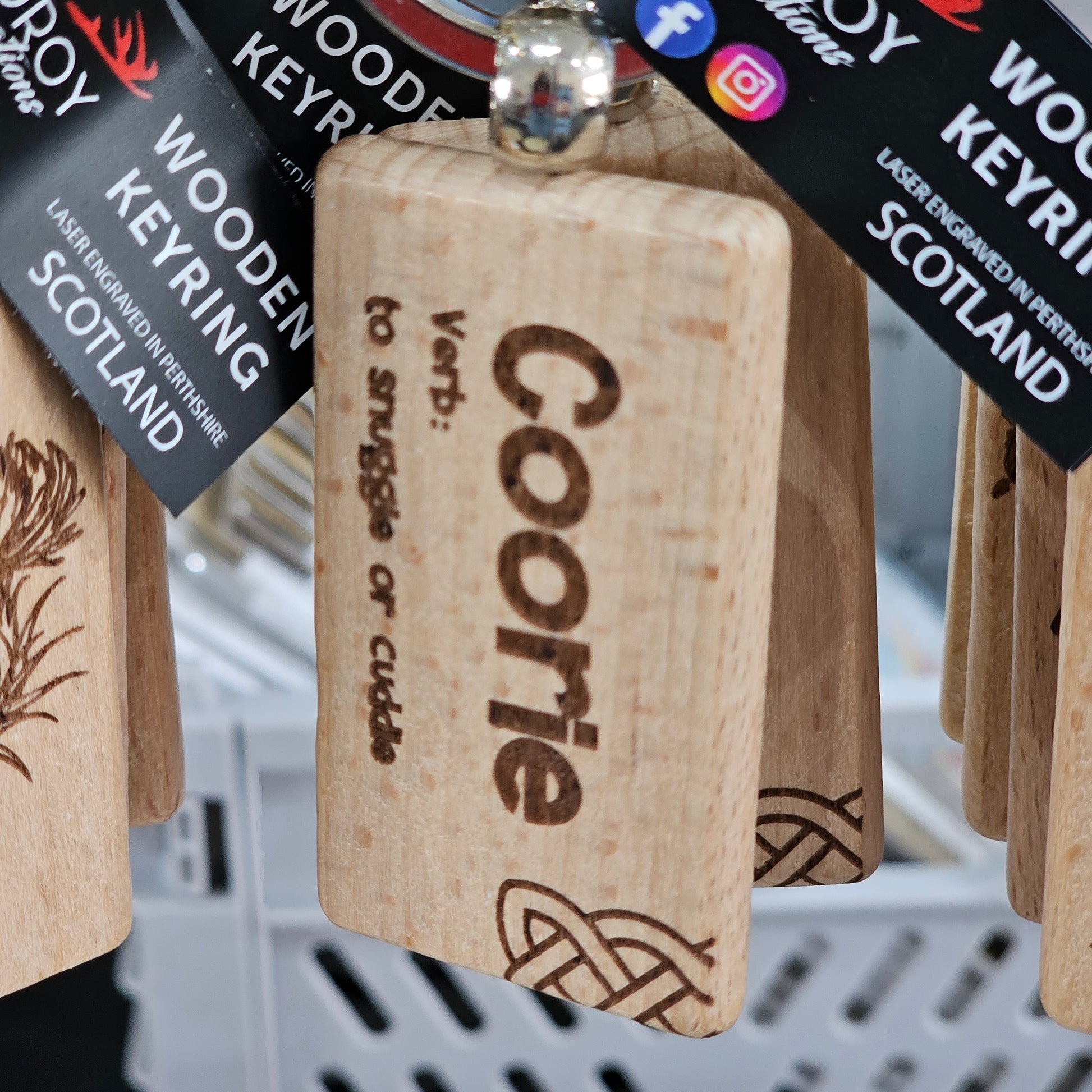 Solid beech wood keyrings by Ardroy Creations with Scottish designs, Scots words and wild swimming slogans