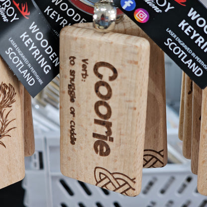 Solid beech wood keyrings by Ardroy Creations with Scottish designs, Scots words and wild swimming slogans